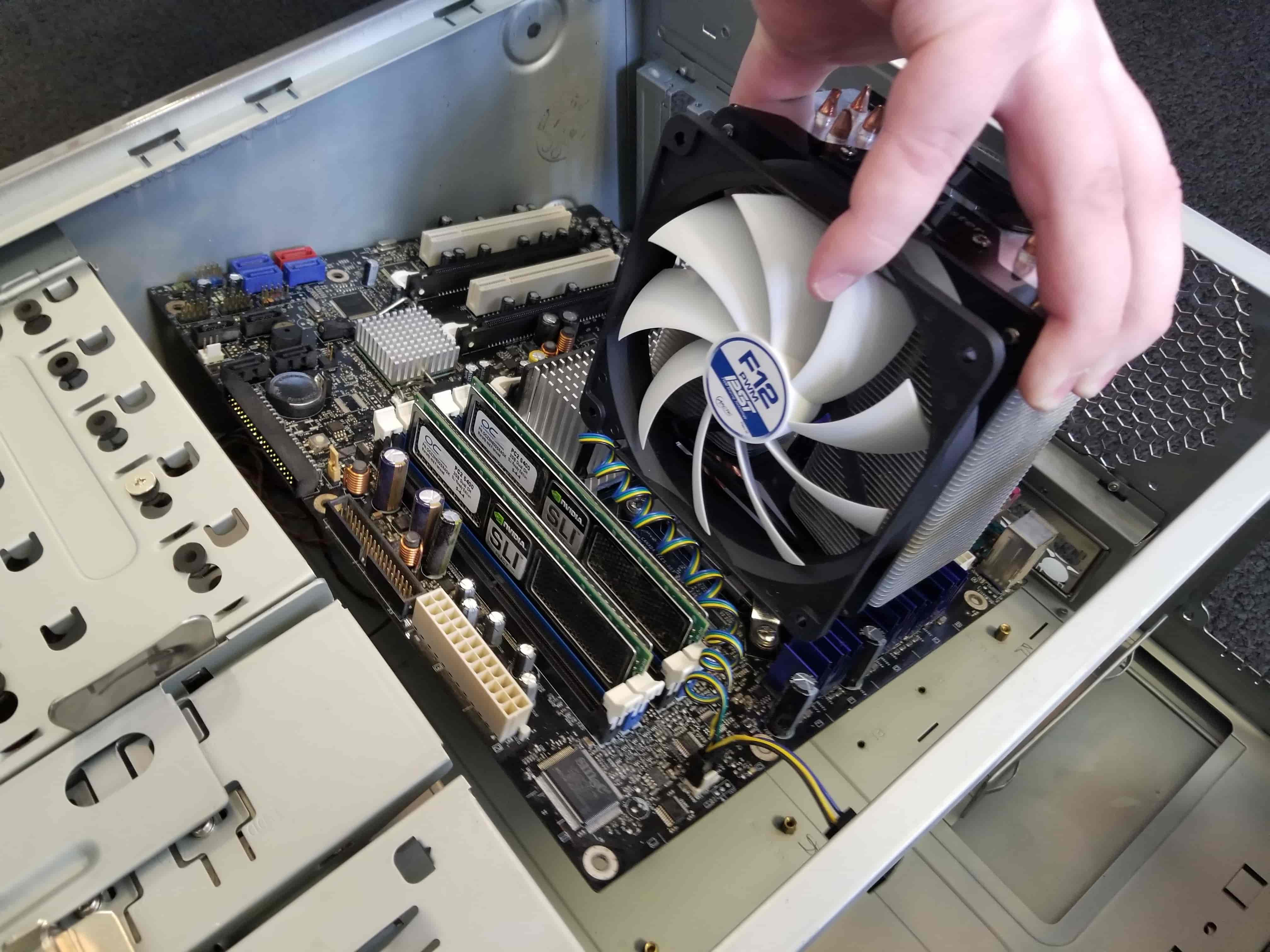 Man repairing motherboard image.